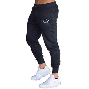 Herenbroeken Europese en Amerikaanse grensoverschrijdende heren Slim Fit Sports Pants Europeaan en Amerikaanse lopende fitness Kleine voet Casual broek Y240513