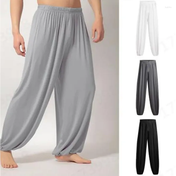Pantalones de hombre Pantalones de mujer elásticos de color sólido cómodos de yoga ocasionales sueltos europeos y americanos