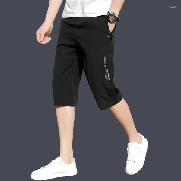 Pantalon masculin Fashion Loose Elastic Taist épissé des poches à fermeture éclair imprimées Capri 2024 Été surdimensionné surdimension