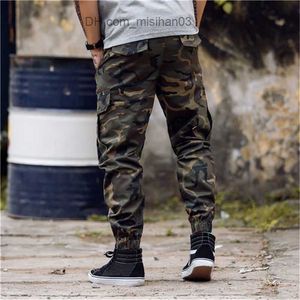 Pantalones de hombre Moda para hombre Pantalones de jogging de camuflaje Monos con cremallera Pantalones de pie de viga Pantalones irregulares Hip Hop Pantalones de diseñador para hombre Z230726