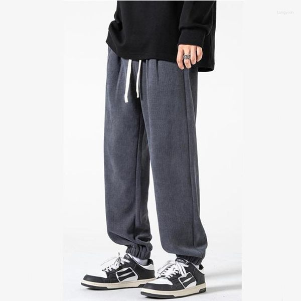 Pantalones para hombres Moda Cintura Cordón Pegatinas Hombre Pantalones de chándal Cilindro de bolsillo suelto Casual Boy Sentido de diseño Pantalones de pie de viga masculina 2023