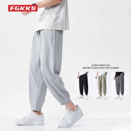 Herenbroeken FGKKS 2023 NIEUWE PAND Men Trend Fashion Slim Nine Minute Pants Hoge kwaliteit Design Selling Brand Trousers Male S2452411