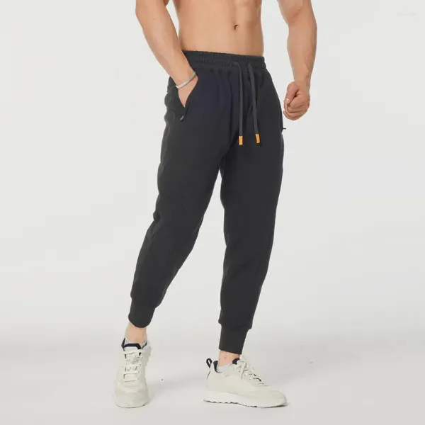 Pantalones para hombres Pantalones de entrenamiento de fitness Leggings Fit Fit Sport con bolsillos laterales con pada de tobillo elástica para gimnasio