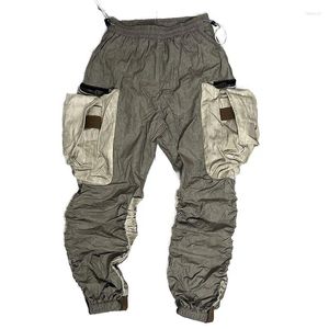 Pantalon masculin multi-déchets multiples sols artisanat en détresse plié et empilé paratrooper serré pantalon pour hommes