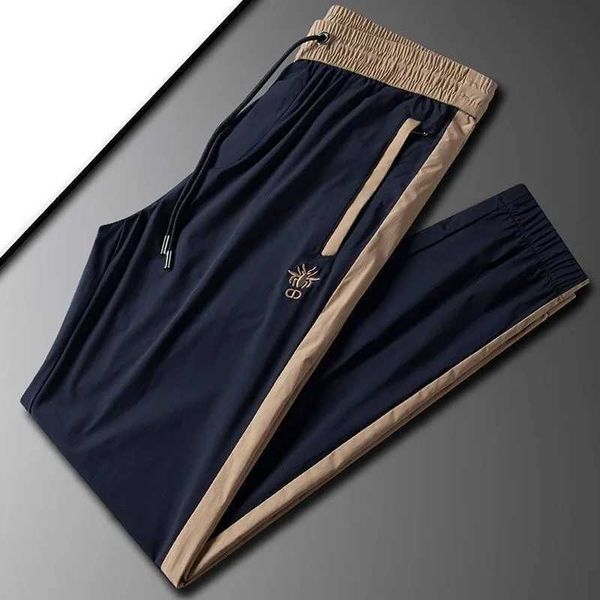 Pantalones para hombres Pantalones casuales para hombre transpirables de seda de hielo de gama alta 2024 Verano Bordado de abeja Moda personalizada Cómoda marca Pantalones deportivos J240328