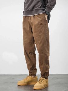 Pantalon pour hommes haut de gamme douce automne et hiver épais élastique petit pied petit pied occasionnel à la mode avec un jean