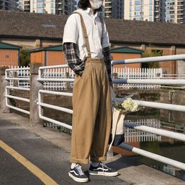 Pantalones de hombre de alta calidad de moda de estilo coreano monos para hombres y mujeres tirantes sueltos de Hip Hop de una pieza de pierna ancha