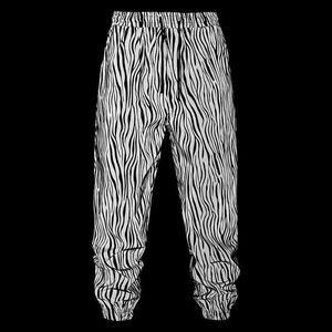 Broeken voor heren Hiphop Zebrapatroon Reflecterende joggingbroek Heren Fluorescerend Dance Party Joggingbroek Festival Rave Night Sportbroek Outfit YQ240108