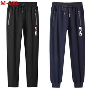 Pantalon pour hommes jogging pantalon jeunesse de la cheville plus taille pantalon de sport noir printemps et automne harem 8xl 9xl pantalon sportif pour hommes J240429