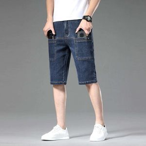 Pantalon masculin Version coréenne jeans tendance slim fit shorts à la mode printemps / été multi-sacs de travail