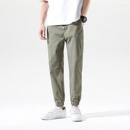 Pantalons pour hommes KRCVES coréen du printemps été sport pour hommes décontracté pour adolescents taille élastique pantalon simple et polyvalent à 9 points