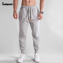 Pantalon masculin Ladiguard 2024 kpop fashion loisir hip hop soft poche running pantant plus taille mens swep-swisping décontracté