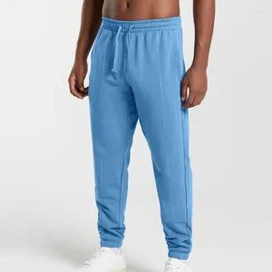 Pantalon masculin loisirs de fitness sportif masculin printemps d'été décontracté simple couleur solide de couleur serrée pour le pantalon masculin à cordon de mode masculin