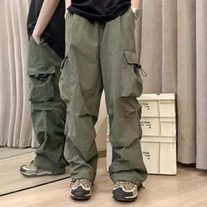 Pantalon masculin pantalon en forme de cargaison élégante avec plusieurs poches