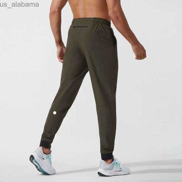 Pantalones para hombres Lululemen hombre Lulu pantalones cortos traje jogger deporte de secado rápido cordón gimnasio bolsillos pantalones de chándal pantalones para hombre cintura elástica fitness todo fósforo 240308