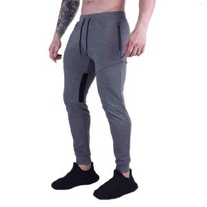 Pantalones para hombres Primavera masculina Casual Fitness Pantalones para correr Cordón Cintura suelta Color a juego Pista de bolsillo corto