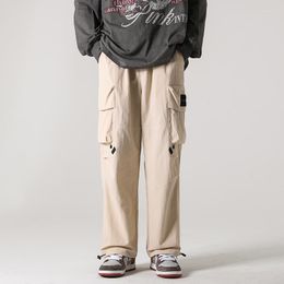 Pantalon homme printemps été cordon pieds jeunesse décontracté mode à la mode salopette pantalon japonais couleur unie Cargo