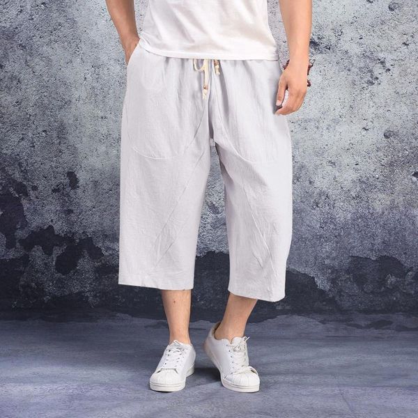 Pantalones para hombres Hombres Baggy Pierna ancha Colgando Entrepierna Hip Hop Longitud de pantorrilla Pantalones de bolsillos de talle medio