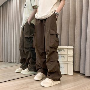 Pantalones para hombres Pantalones de carga casuales para hombres Ropa de calle Pantalones de trapeador holgados con bolsillos grandes Harajuku Hip Hop Pantalones sueltos de pierna ancha para mujeres Monos 230831