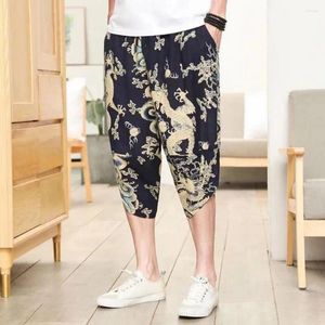 Pantalon masculin pantalon de style chinois à imprimé rétro décontracté avec des poches latérales de la taille élastique