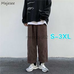 Pantalones de hombre Casual de talla grande 3XL pantalones rectos de pana sólida para hombre sueltos Ins Chic cintura elástica moda estilo coreano Streetwear Y23