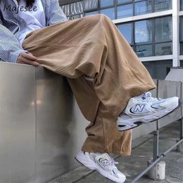 Herenbroek mannen casual retro harajuku ins mode nieuwe high street ulzzang baggy all-match corduroy youngster college uisex pantalones y2302