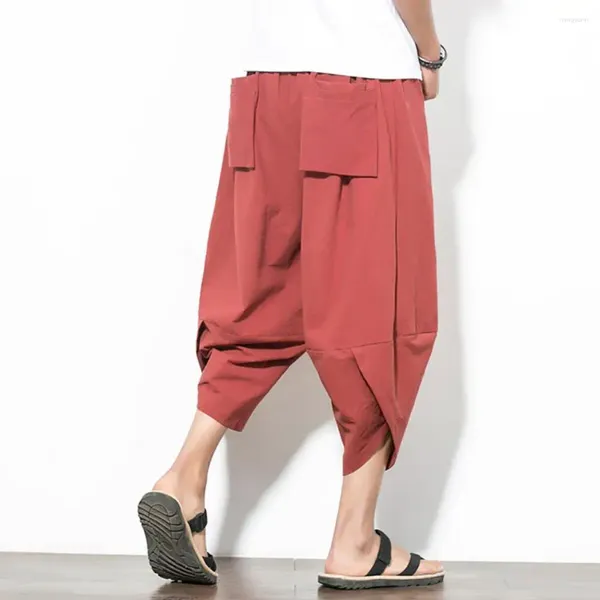 Pantalones para hombres pantalones casuales estilo japonés harén de medio calendro con bolsillos múltiples de entrepierna profundas para ropa diaria