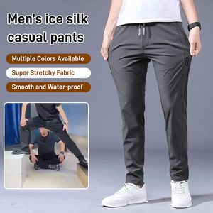 Pantalons pour hommes Hommes Pantalons en soie de glace stretch à séchage rapide Couleur unie Taille moyenne Lâche Respirant Jambe droite Casual Sports minces 230715