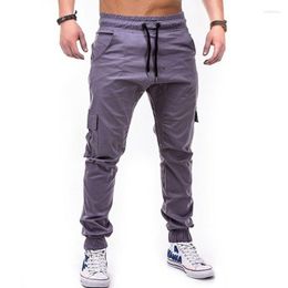 Pantalons pour hommes Hommes Multi-poches Splice Jogger Mâle Taille Lâche À Lacets Sport Crayon Pantalon Quatre Saisons Casual Tissu Tissé Sportswear