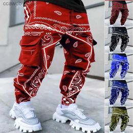 Pantaloni da uomo Pantaloni cargo da uomo Stampa riflettente Sciolto Hip Hop Moda Street Wear Salopette con tasche grandi Pantaloni 4 stagioni di colore brillante T240108