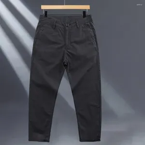 Pantalons pour hommes Hommes Soft Respirant Casual Neuvième Pantalon avec poches d'absorption de la sueur Bouton de taille moyenne Fermeture à glissière Couleur unie