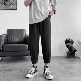 Herenbroek mannen zomer dunne Koreaanse stijl losse mode harem broek solide eenvoudige casual all-match hosen dagelijkse zakken elastische taille y2302