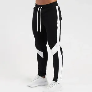 Pantalon masculin pantalon masculin sportif de printemps / automne élégant avec des poches