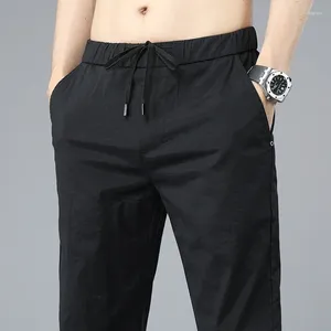 Pantalon masculin masculin marque d'été ultra-mince en soie extensible décontractée les affaires commerciales masculines minces minces minces confortables et haletants