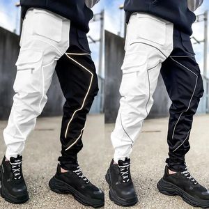 Pantalon masculin masculin décontracté noir patchwork white cargo lâche plus taille rayée multi-poche jogging sport fitness fitness hip hop jogger pantalon