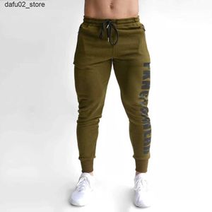 Pantalon masculin masculin coton marque décontractée pantalon skinny joggers pantalons de survêtement