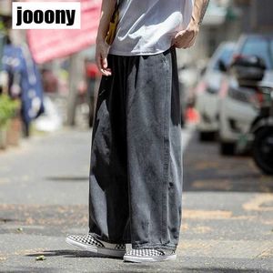 Herenbroek heren jeans hiphop straat kleding skateboard neutrale denim broek heren brede poot goederen losse rechte zakken q240429