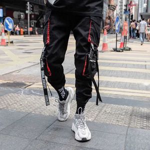 Pantalon masculin pantalon de cargaison de jogger avec plusieurs poches pantalon de taille de taille élastique masculine.