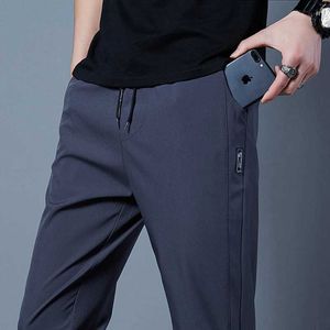 Herenbroeken heren broek 2023 Casual zakelijke stretch slanke fit elastische taille Koreaanse klassieke blauw zwart grijs mannelijk merk broek Y240513