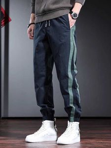 Pantalon masculin à la côté de la bande de coton pantalon bleu mode sport de la mode décontractée