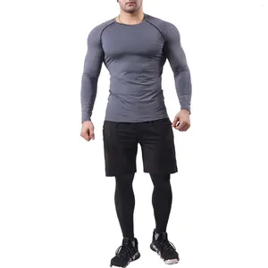 Pantalones para hombres Traje de estado físico ajustado al aire libre pantalones deportivos establecidos para la base de entrenamiento de baloncesto estirado masculino Hombre