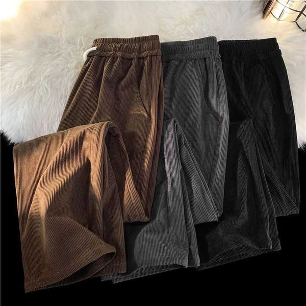 Pantalon masculin masculin pantalon en velours côtelé 2023 Nouvelle coréenne Couleur unie à la mode décontractée Drape Baggy Drape masculin Vêtements S-3xl D240425