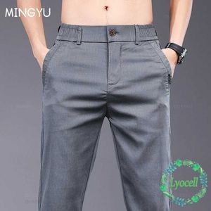 Pantalons hommes Mingyu marque vêtements d'été Lyocell tissu pantalons décontractés pour hommes mince taille élastique affaires gris noir coréen hommes pantalons J240328
