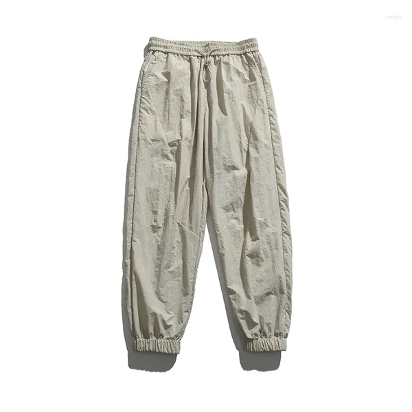 Pantalon pour hommes minimalistes d'été de couleur solide de couleur élastique à cordon de taille à cordon de la mode