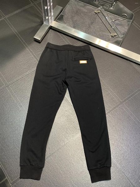 Pantalones para hombres MMsix Hombres Pantalones de chándal Etiqueta de número desordenado Mujeres Bolsillo LOGO Cuero Cintura elástica Pantalones de gimnasio Comentarios coreanos Mucha ropa