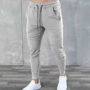 Herenbroeken spierfamilie herfst en winter nieuwe sportbroek heren casual broek Koreaanse versie slank fit fitness broek heren leggings y2405131adw