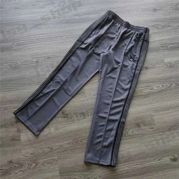 Pantalon pour aiguille à aiguille pantalon multicolore rayures aiguilles pantalons masculins 1 1 pantalon de pantalons de piste de papillon brodé de haute qualité de haute qualité 551