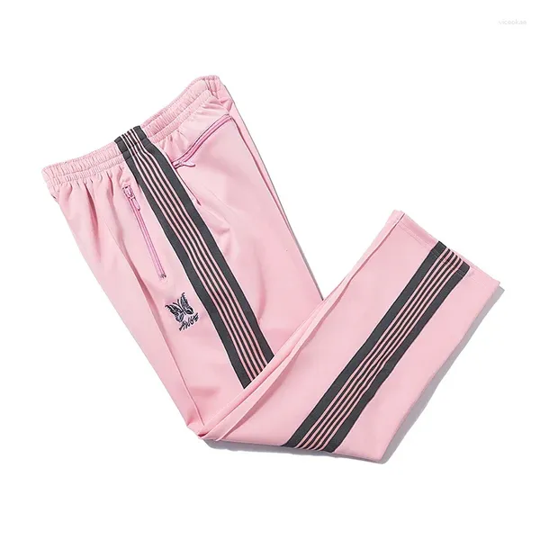 Pantalons masculins aiguilles Arrivée pantalon rose pantalon noir broderie sangle de ligne de sangle pantalon zipper hommes femmes surdimension