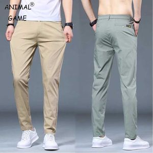 Pantalones para hombres nuevos pantalones de seda de hielo hombres estiramiento delgado de verano liviano cintura elástica algodón clásico pantalones coreanos machos grandes jogging swewear y240513