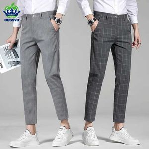 Pantalon masculin Nouvelle affaires de mode d'été Stripe plaid pantalon de longueur de cheville.